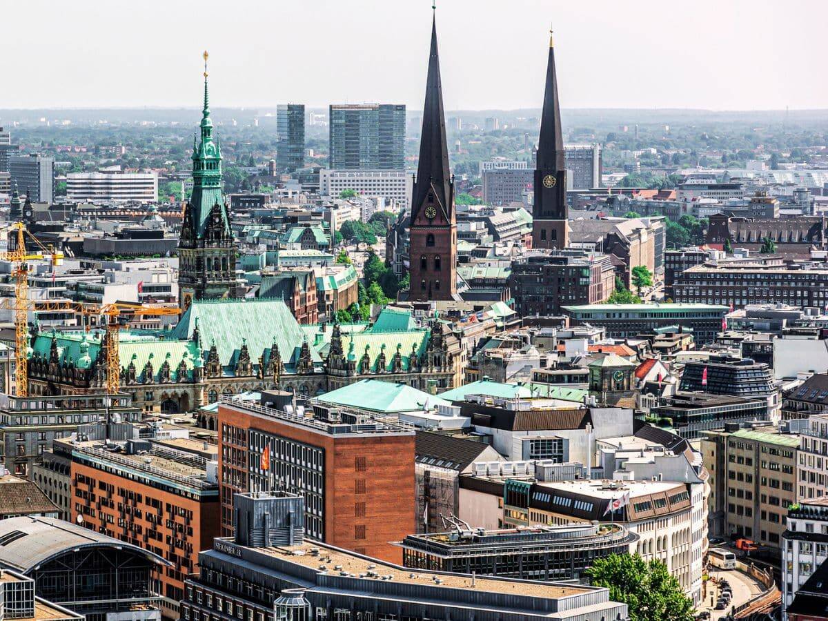 Unusual Things to Do in Hamburg Cityscape View Unusual things to do in Hamburg hidden in a cityscape view from above with St. Michaels Church Spire