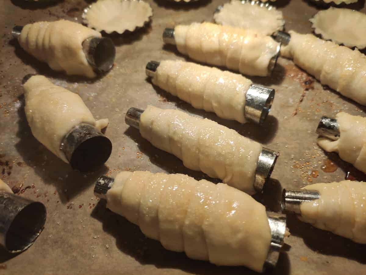 Cream horns coated with egg.