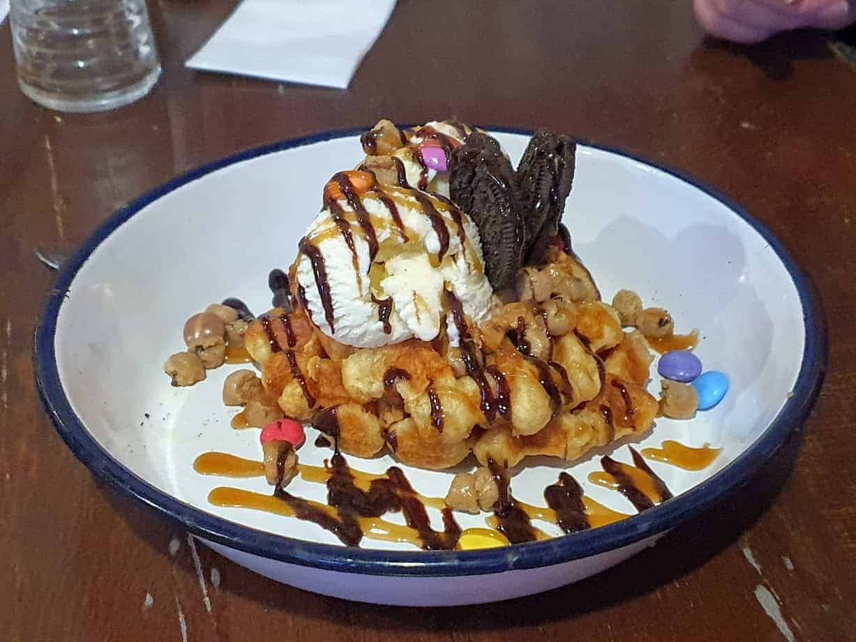 Peanut butter oreo waffle stack in a white dish from the Horn in Hand, Nottingham