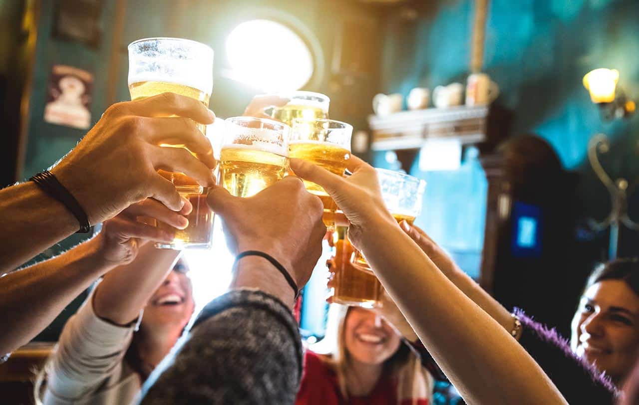 Group of friends toasting beers