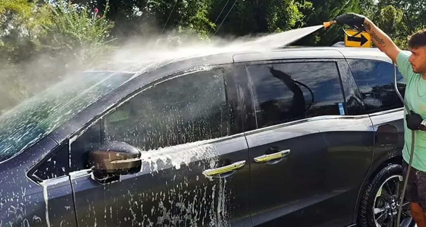 Car wash removing pollen, dirt, and road contaminants from a vehicle