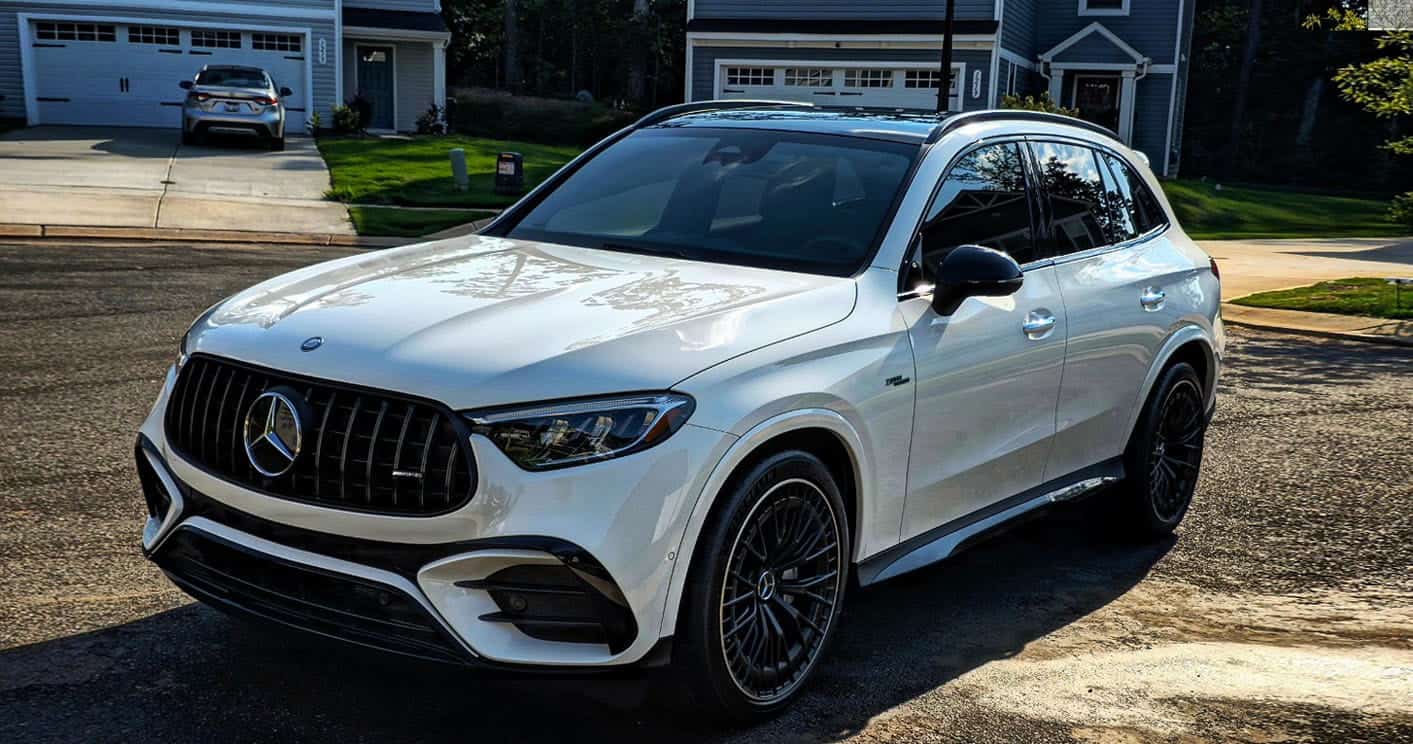 Luxury white Mercedes SUV after professional auto detailing and long term vehicle protection service