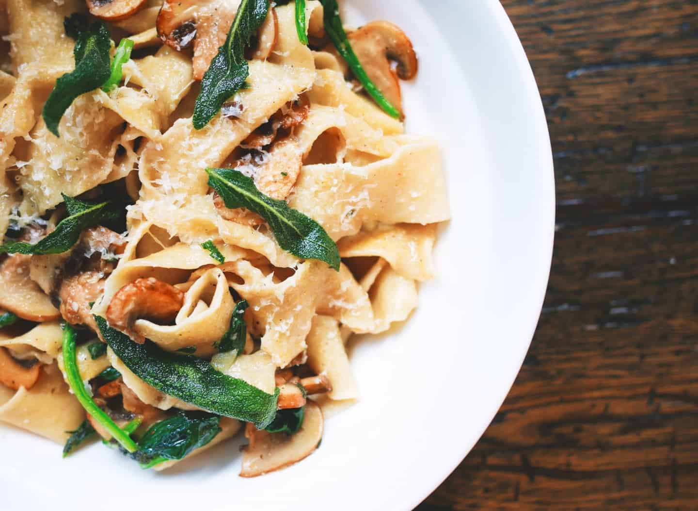 A plate of pasta and salad