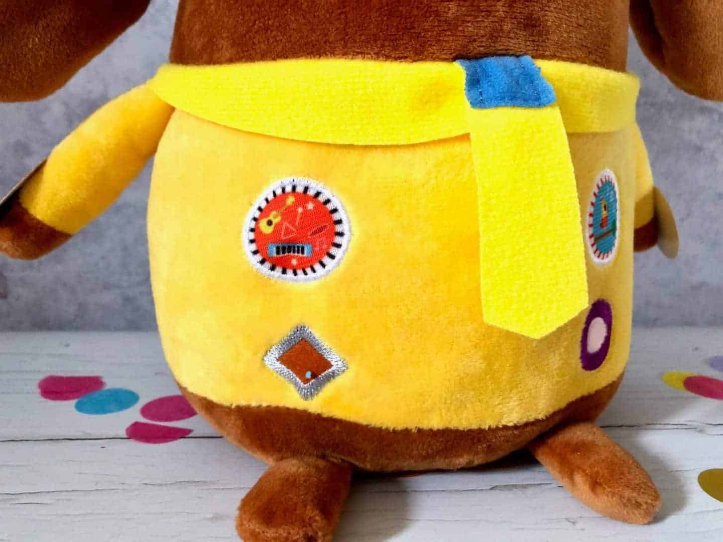 Stitching on Hey Duggee's badges
