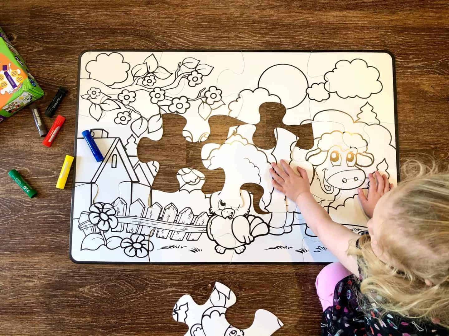 L putting the paint-a-puzzle pieces together