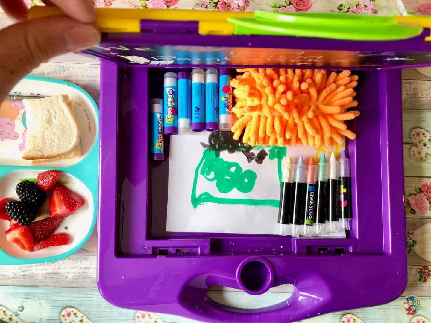 Storage compartment in the Little Brian Paint Sticks Mini Art Station