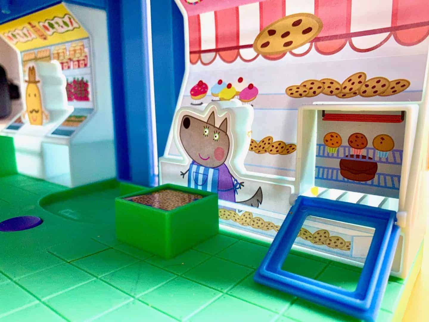 open the oven door on the peppa pig shop playset
