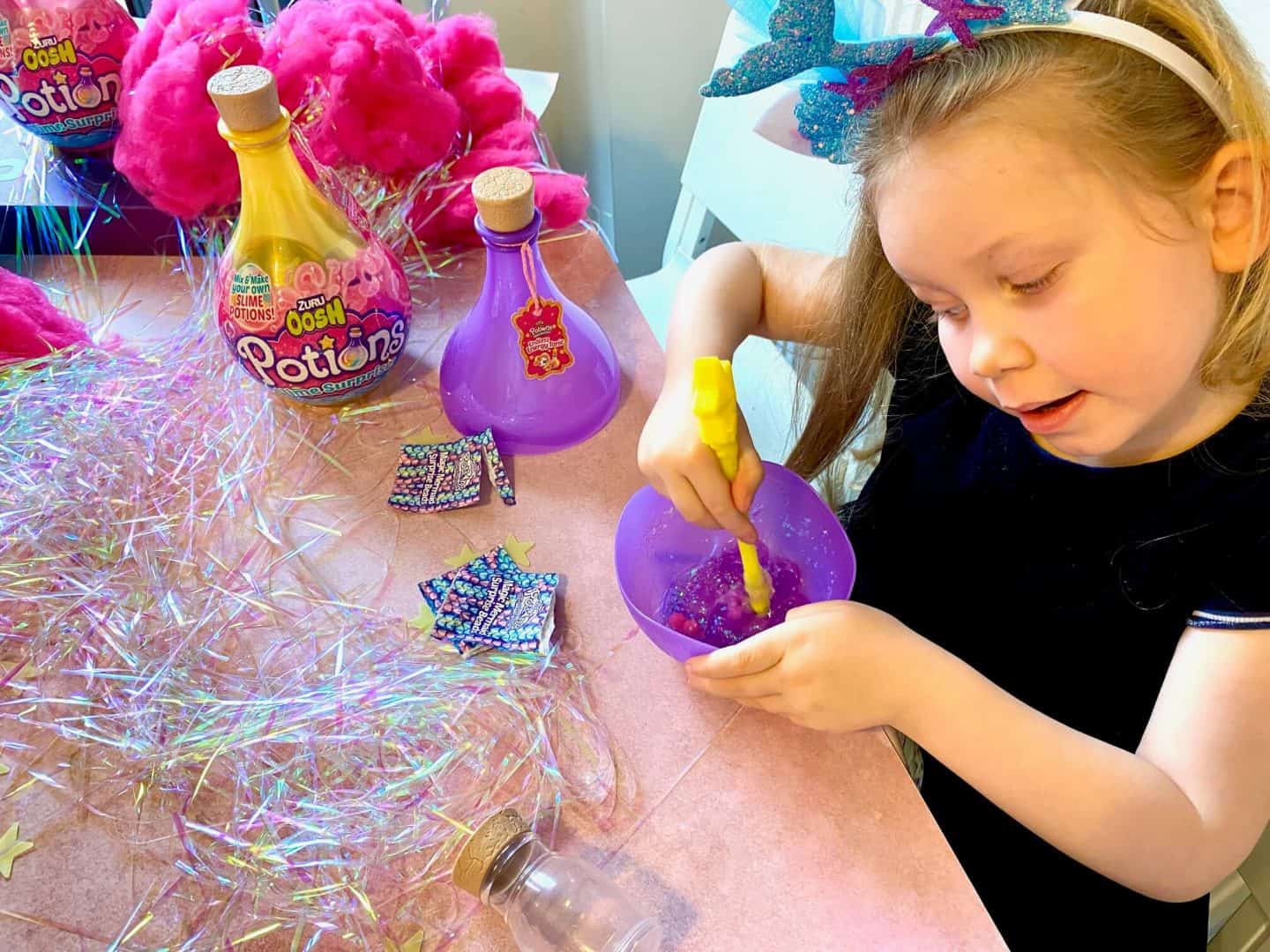 Adding-in-the-extra-ingredients-for-the-magic-potion-Zuru-Oosh-Potions