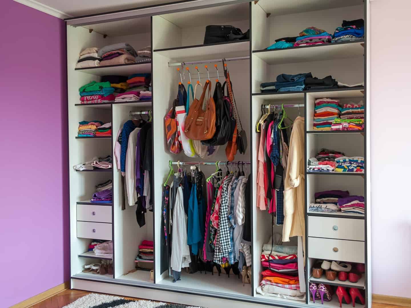Wardrobe full of colourful clothes