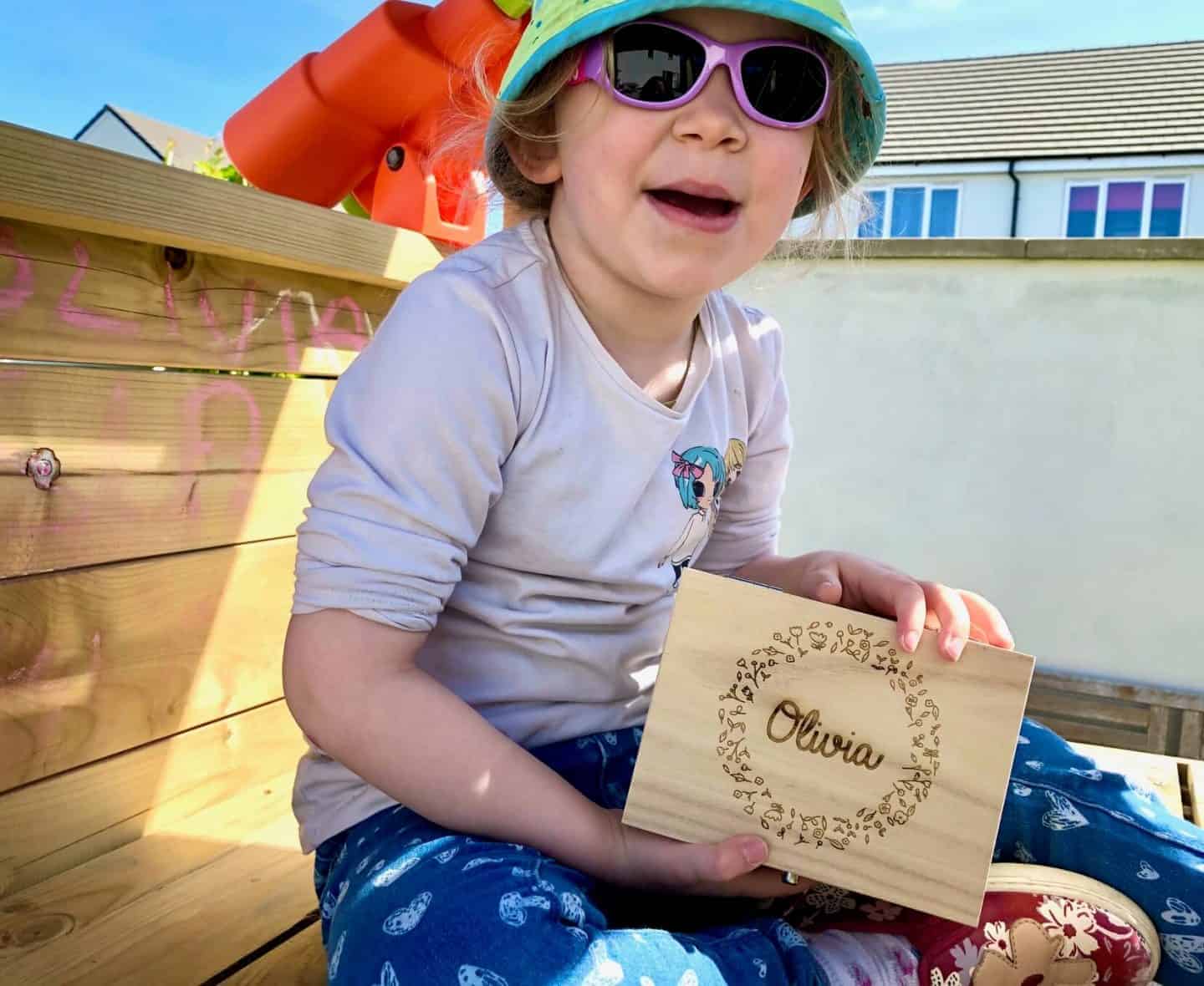 Personalised Gifts For Any Occasion - L with her wooden box outside