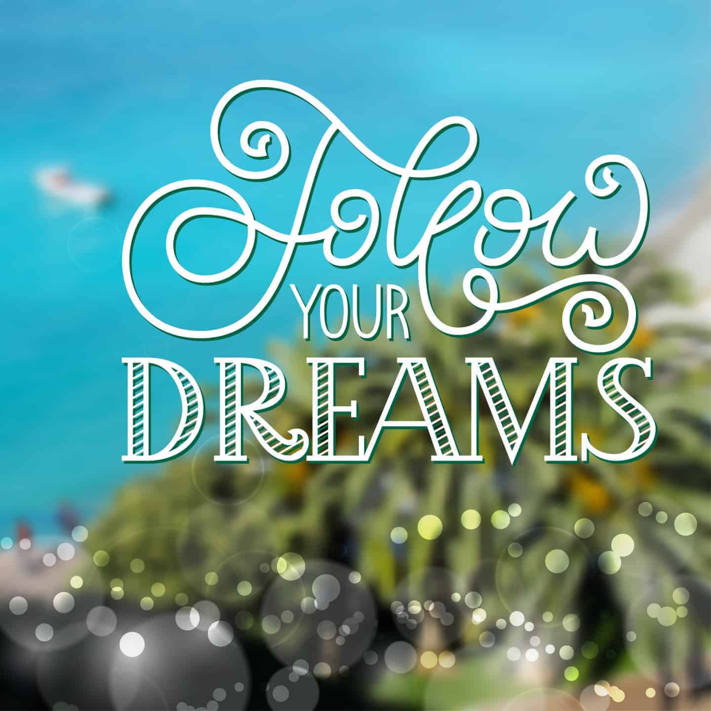 White \'follow your dreams\' on blue and green background