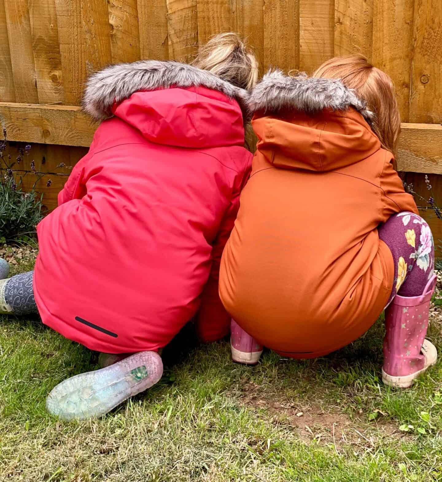 busy girls outside in their new jackets
