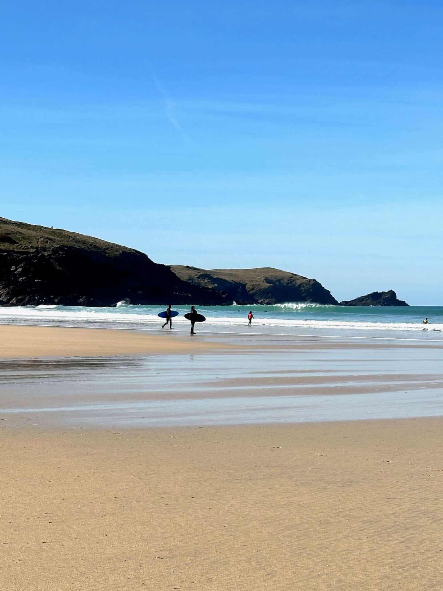 surfers at Fistral Beach