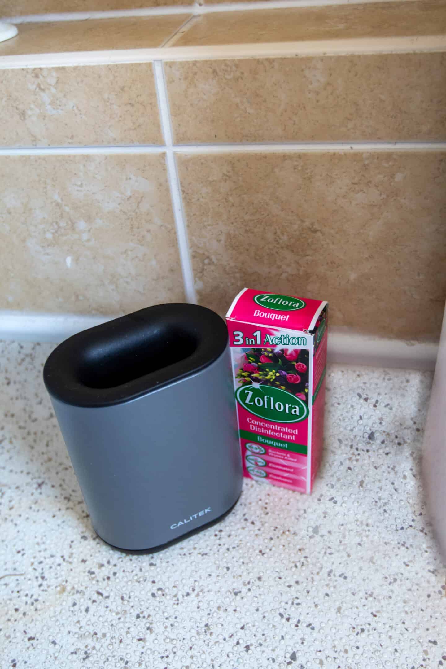 Zoflora next to a toilet brush holder