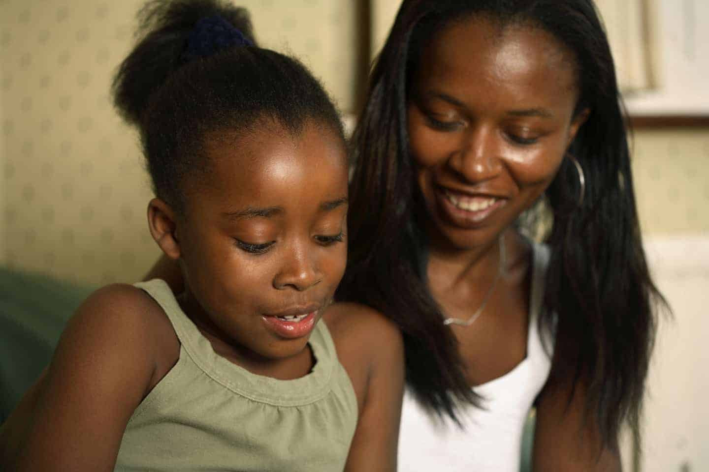 mother and daughter reading together