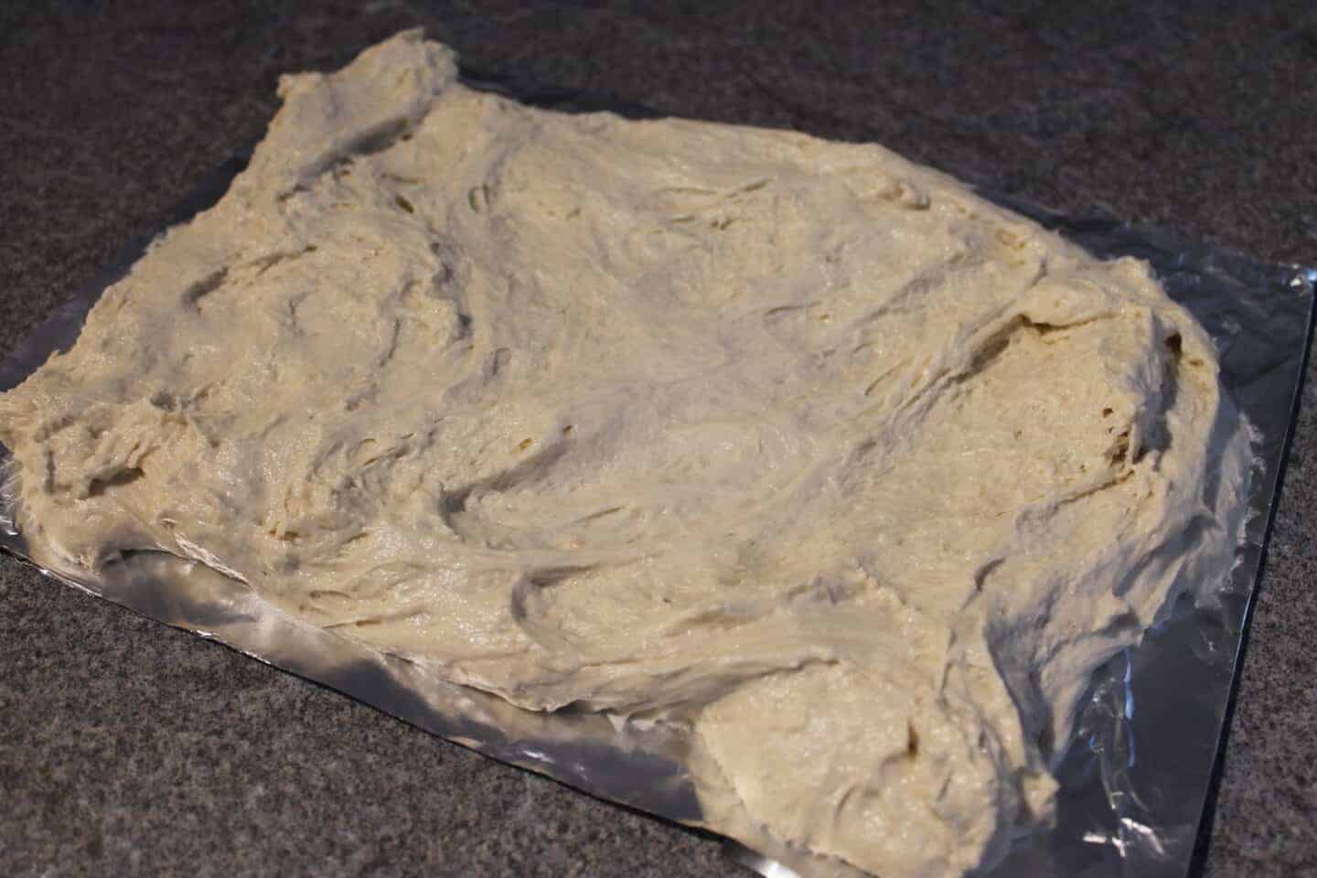 dough spread on a piece of foil