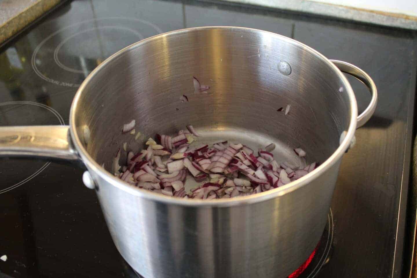 Frying red onion on the hob