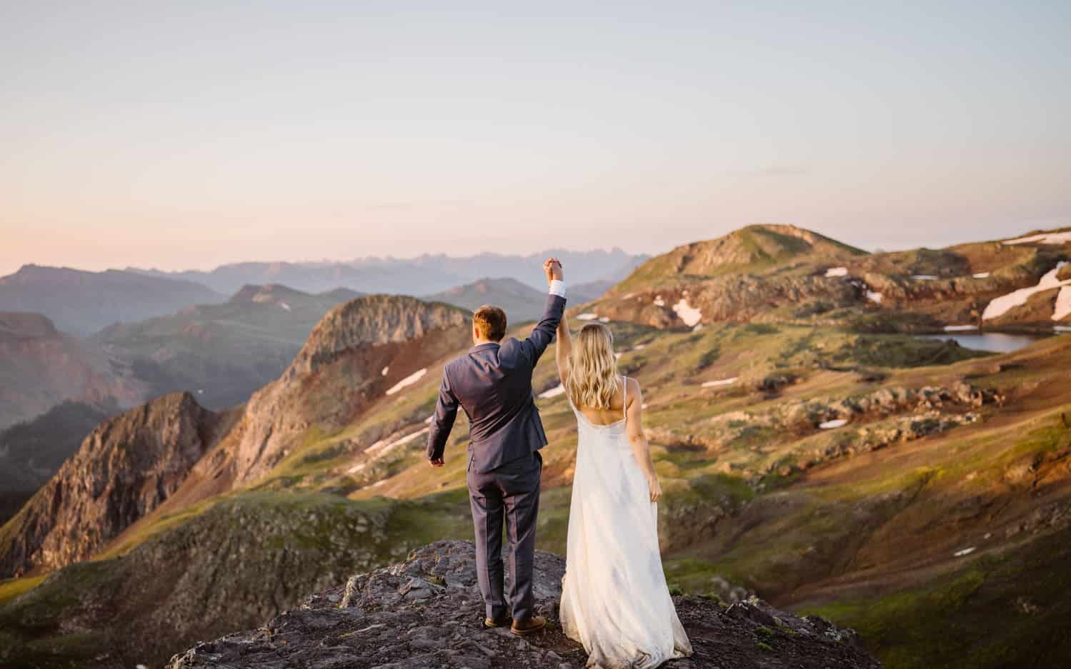 Bride and Groom Holding Hands Colorado Mountain Elopement Packages