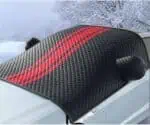 Glossy black carbon fiber sunshade with red stripes for car windshield, designed to block heat and UV rays, providing protection and style during winter or summer drives.