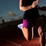 athlete running in a track