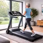 walking treadmill with older woman