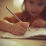 How to Support a Child Who Really Loves Writing (and When a Children’s Book Editor Can Help)