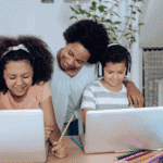 Mother supporting her children while homeschooling - The Ultimate Guide to Homeschool Learning Platforms_ Top Academy Programs for Families