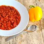 Smoky baked beans in a white bowl