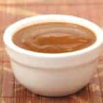 Curry sauce in a small ramekin.