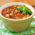 Minestrone soup in a green mug