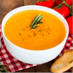 white plate with butternut squash soup