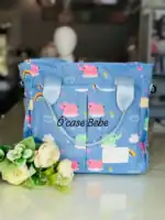 Sac à langer bébé multifonction, spacieux et élégant, idéal pour parents nomades.