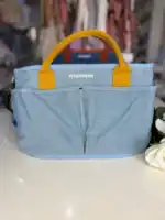 Sac à langer bébé multifonction, spacieux et élégant, idéal pour parents nomades.