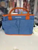 Sac à langer bébé multifonction, spacieux et élégant, idéal pour parents nomades.