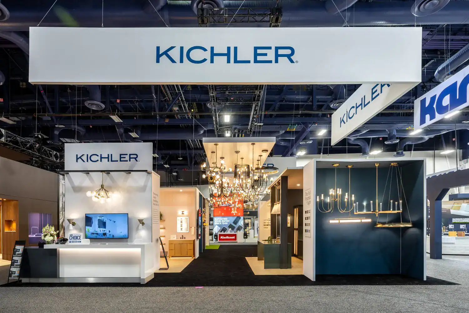 Kichler exhibit using illuminated signage and decorative lighting at KBIS 2025