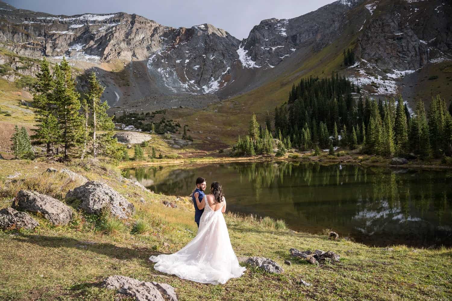 A couple sharing a laugh at Alta Lakes outside of Telluride.