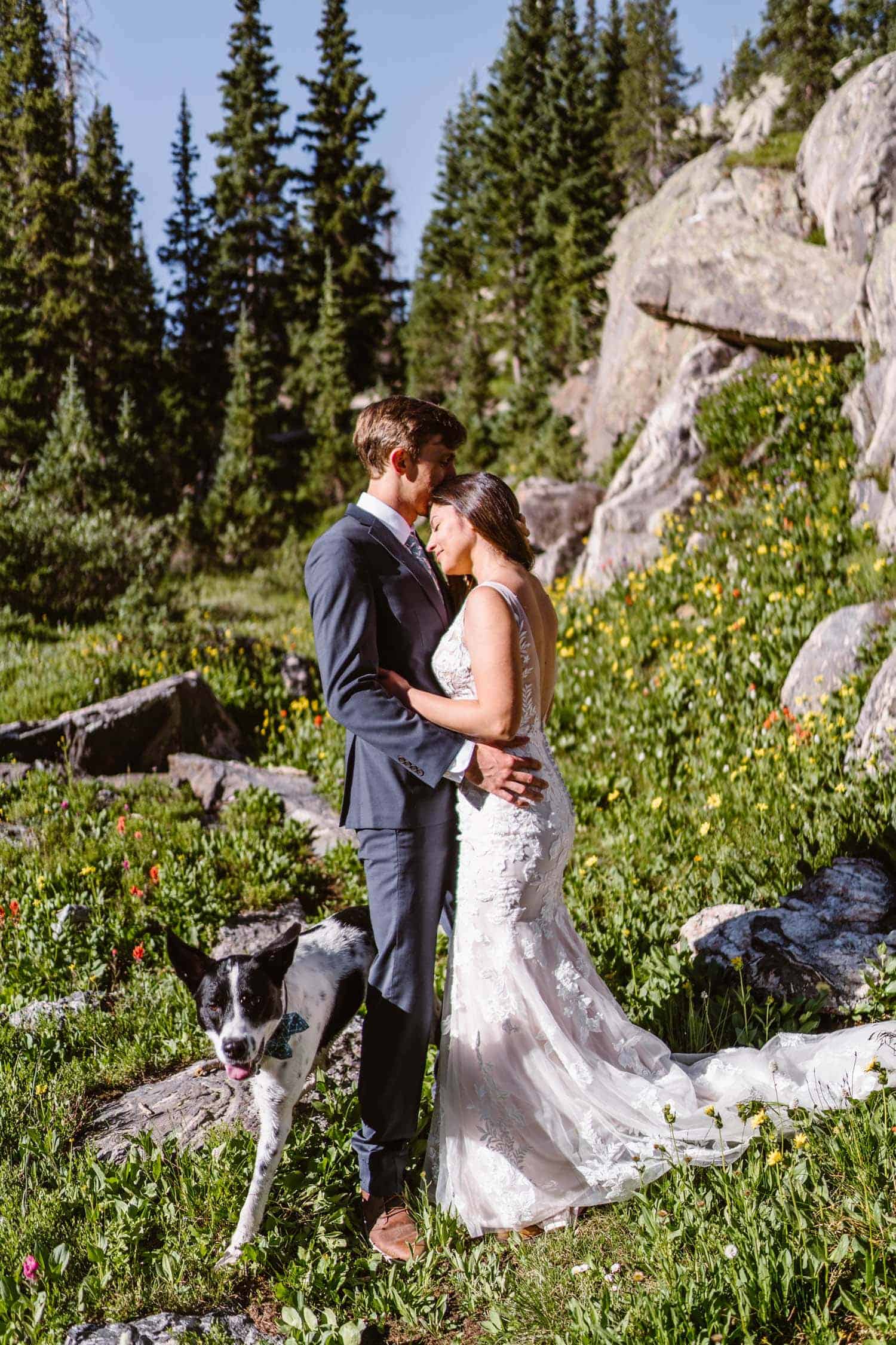 Bride and Groom Near Flowers Grand Lake Colorado Elopement