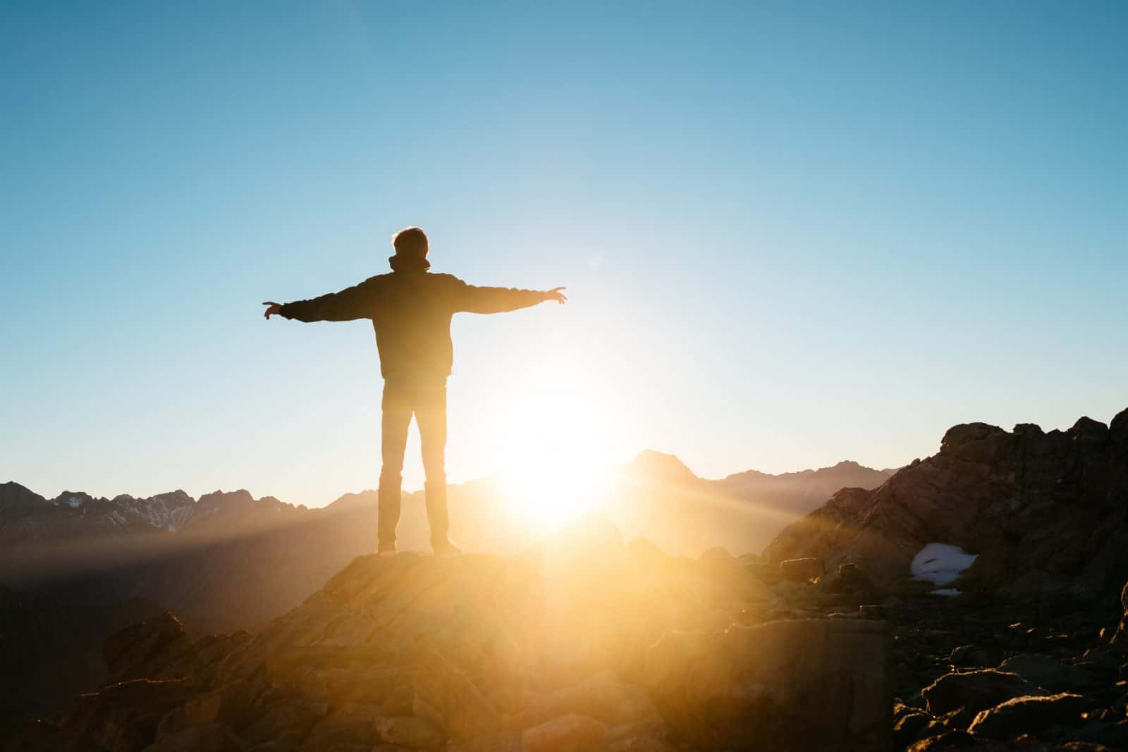 man enjoying sunrise