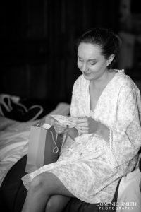 Hazel receiving a gift from her Husband-to-be