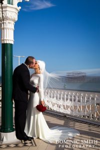 Bridal photo taken at the Bandstand on Brighton Seafront with the West Pier in the background