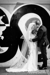 Bridal photo taken on Brighton Seafront with the graffiti in the background