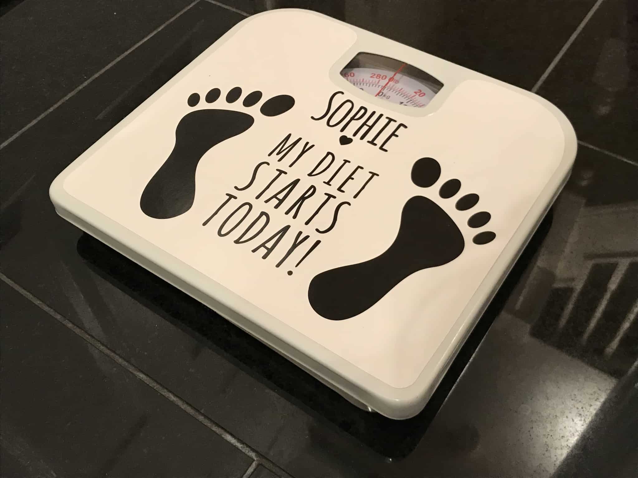 scales with the words my diet starts tomorrow and the name Sophie.