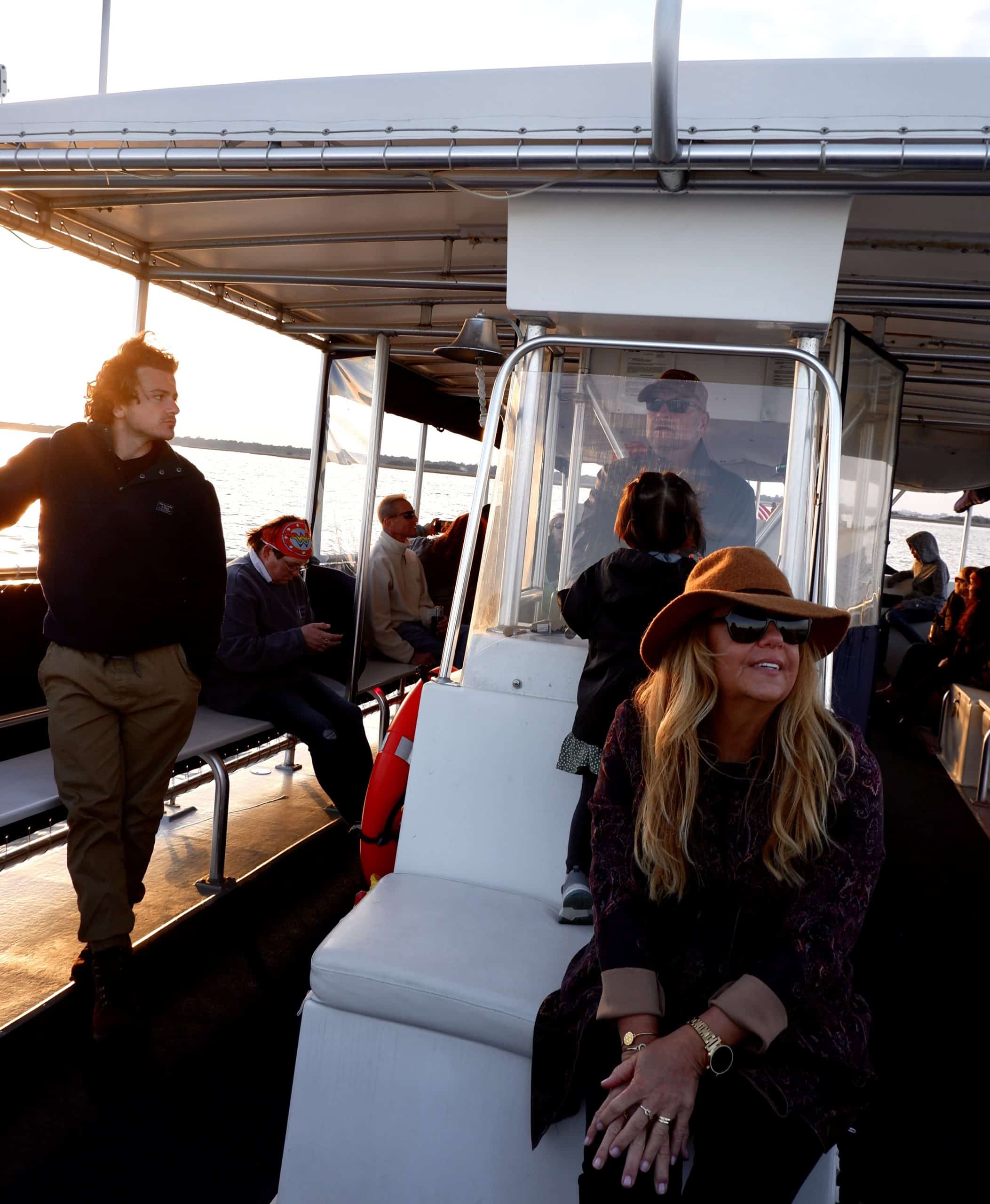 Boat full of many people enjoying the ride. Party boat rental Charleston, SC