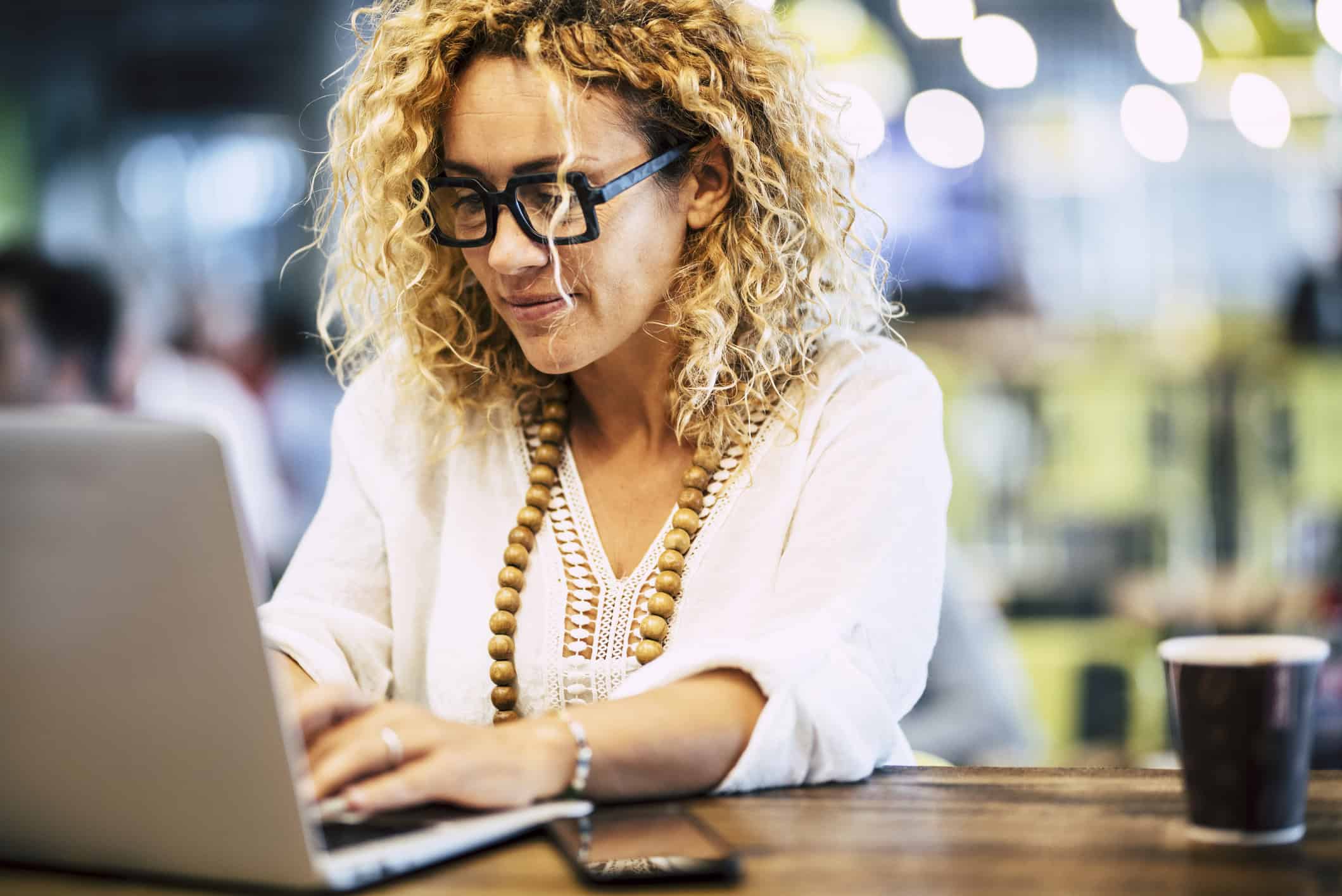 Woman searching online to meet people.
