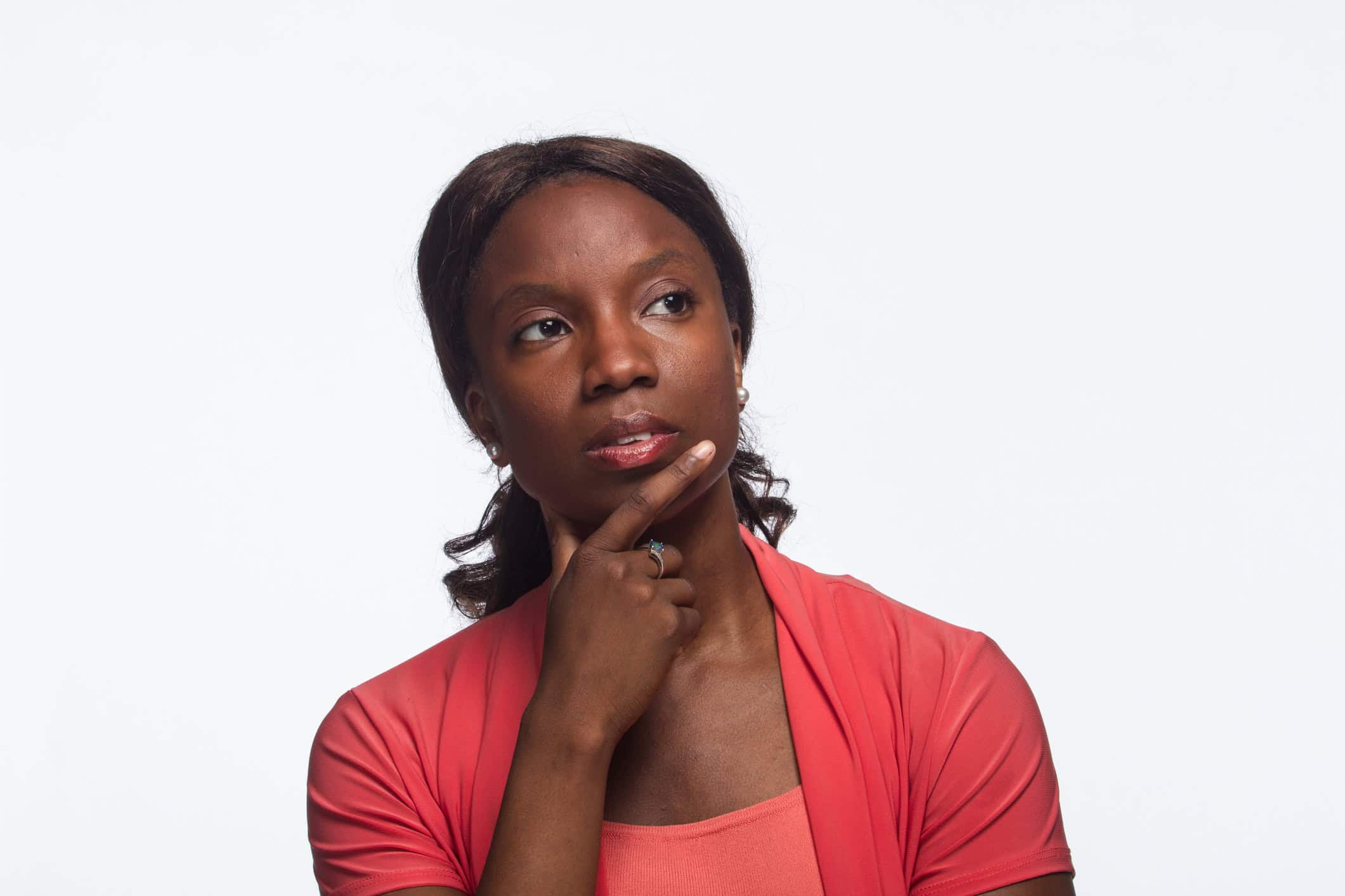 Woman contemplating what's stopping her from finding love in her 40s.