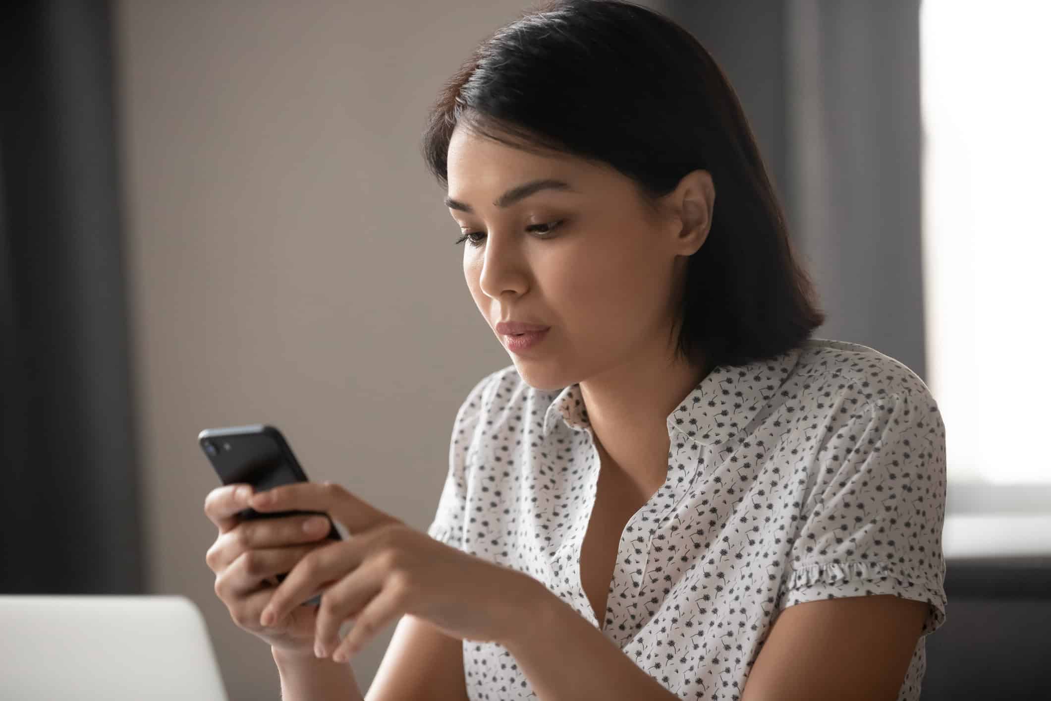 Woman texting with her partner hoping to build her relationship.