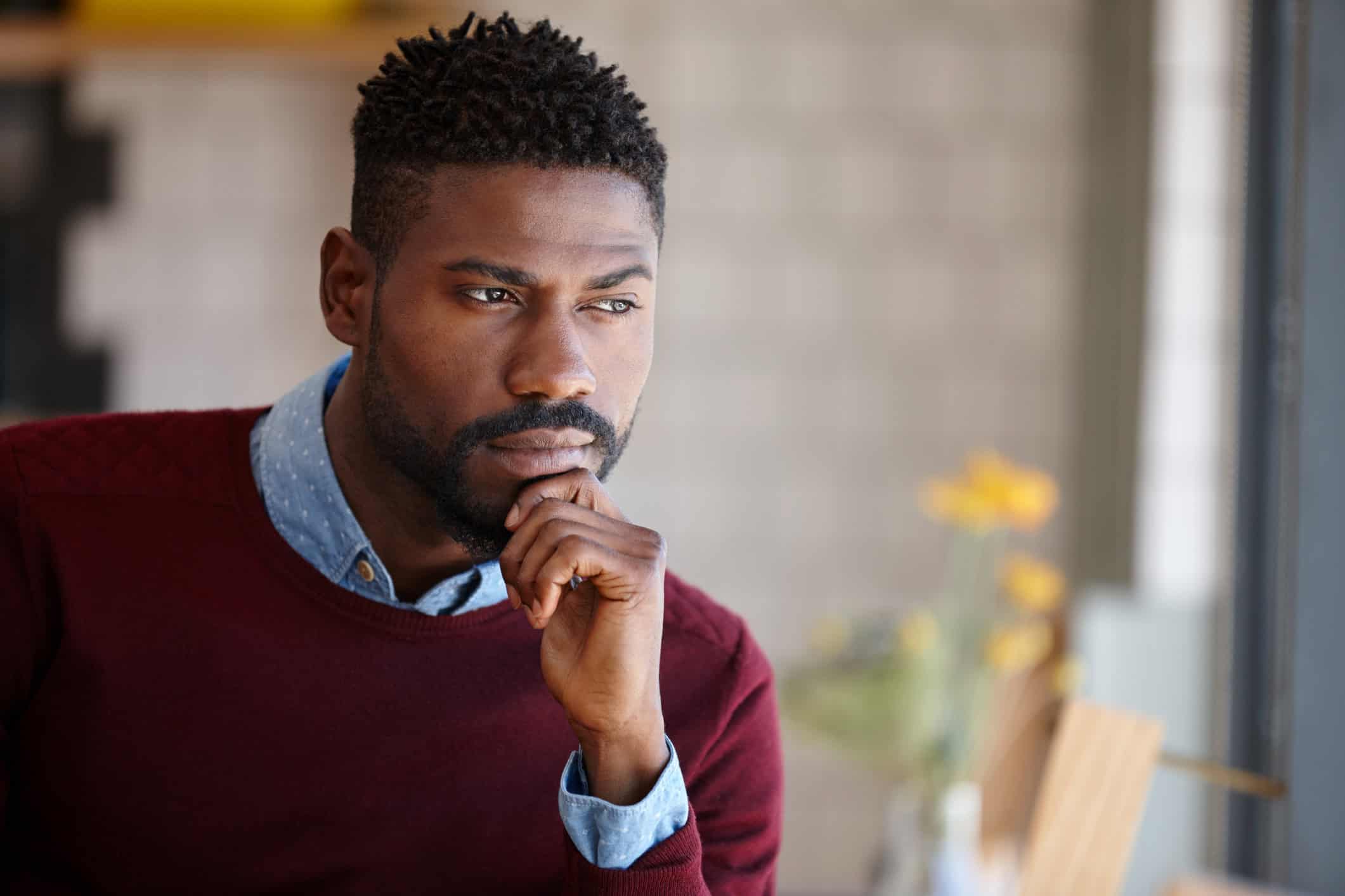 Man waiting and wondering if he's in the right relationship.