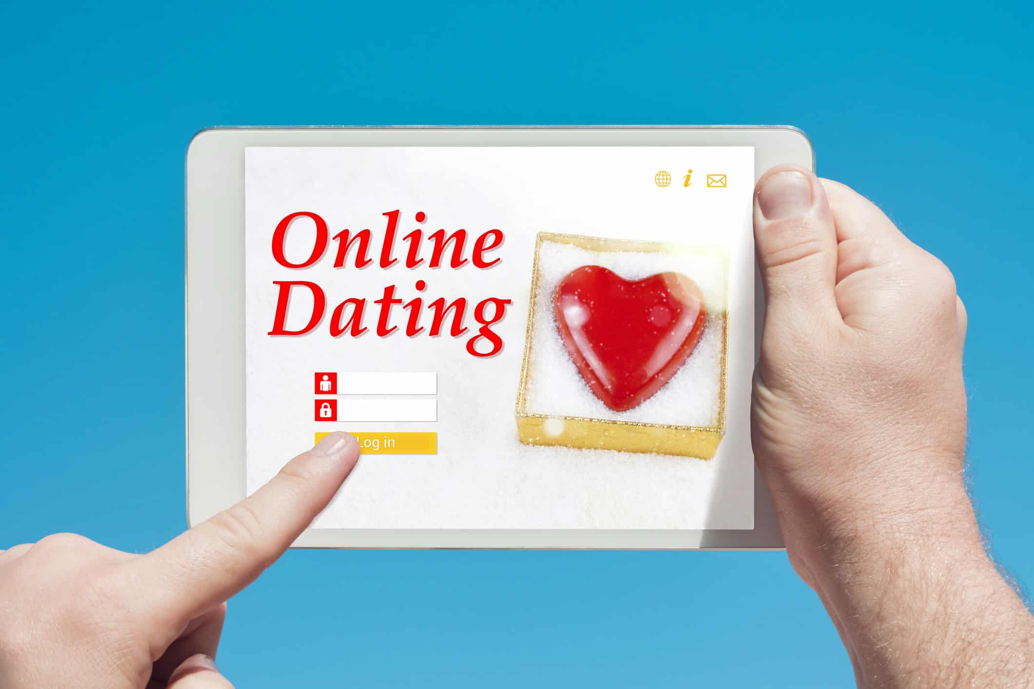 Man holding a tablet displaying online dating.