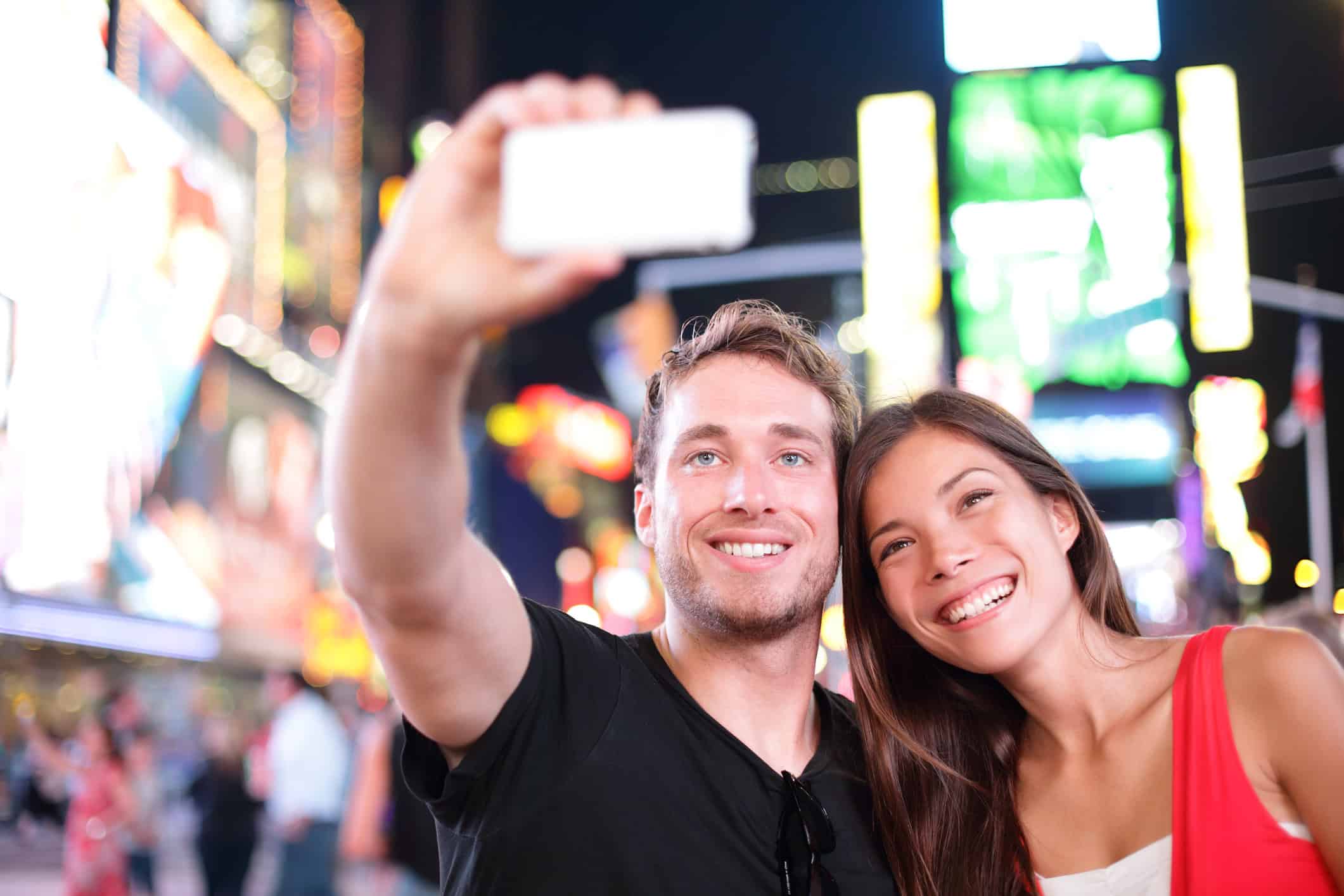 Couple in a new relationship taking a selfie of themselves.