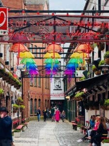 Commercial Court in Belfast is lined with art and neon umbrellas suspended overhead, making it a favourite with Europe day trippers.